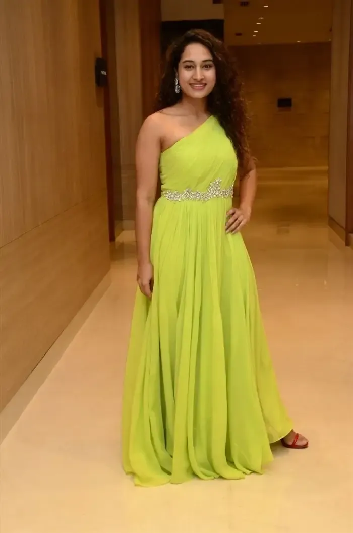 Indian Actress Pooja Ramachandran Images in Long Green Gown